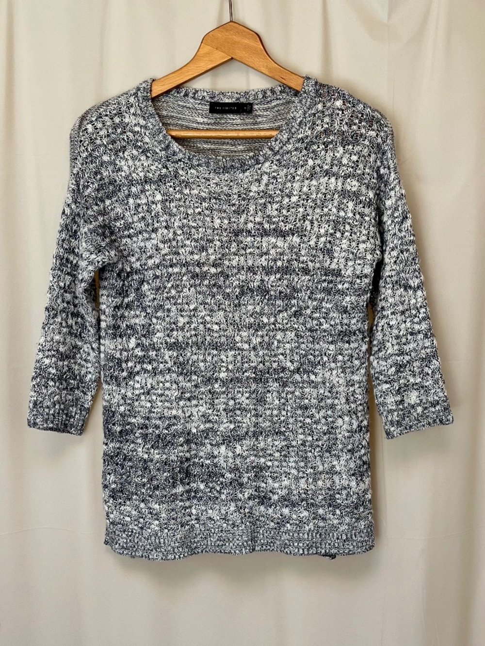 The limited variegated knit sweater